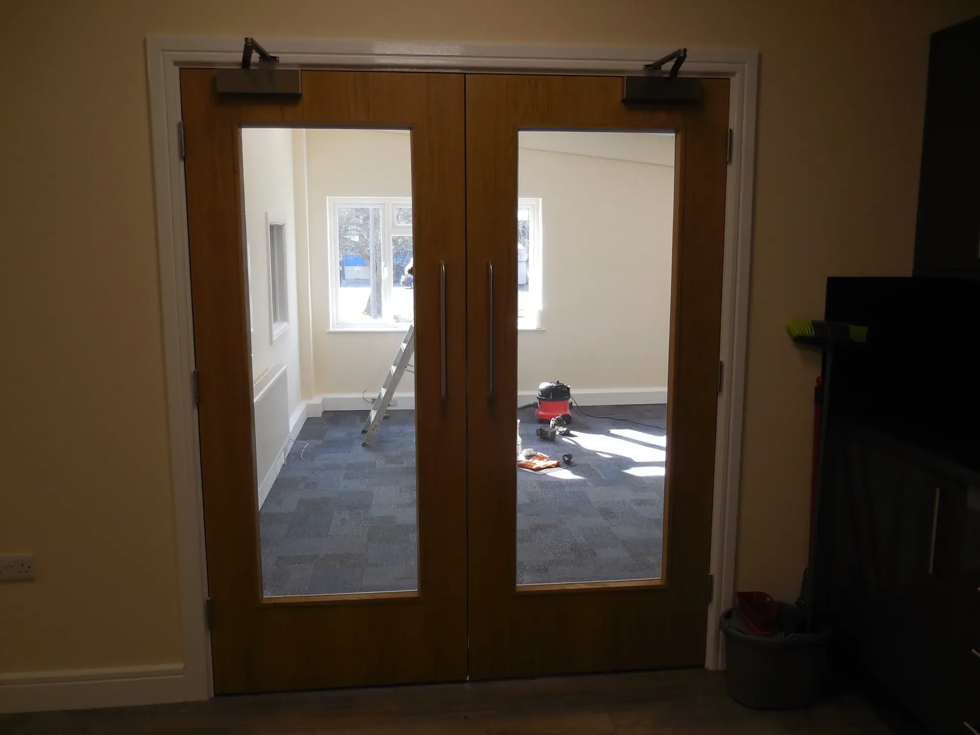 Internal glazed double doors leading into office space